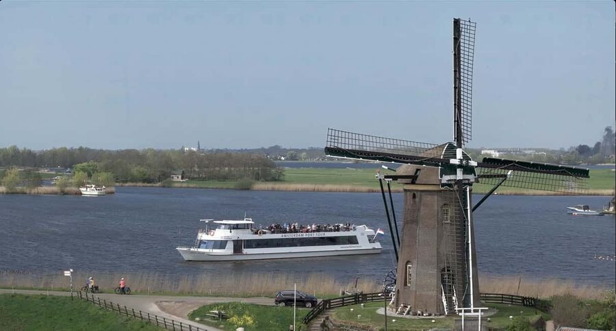 Amsterdam: Tulip Farm Visit, Keukenhof, and Windmill Cruise - The best parts of the day at a glance