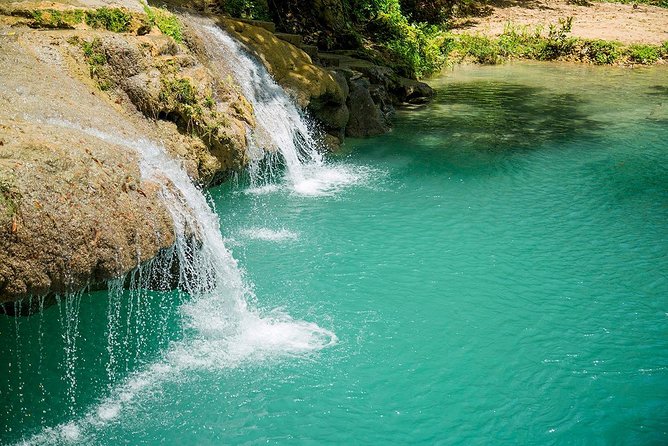 Blue Hole Waterfalls and Rasta Garden from Montego Bay - Booking, cancellation, and weather notes