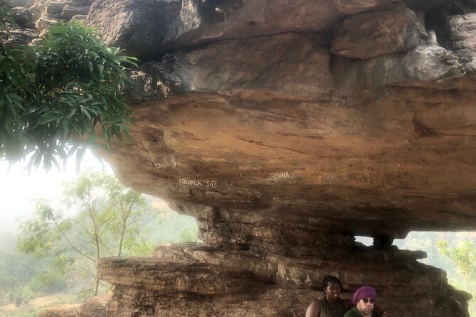 Experience Boti Waterfalls, Aburi Botanical Gardens & Tetteh Quarshie Cocoa Farm - Umbrella Rock, the three-headed palm, and the falls