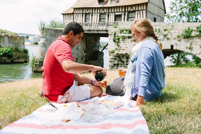 From Paris: Monet Gardens & Giverny Bike Tour with Picnic Stop - A riverside picnic beside the Seine