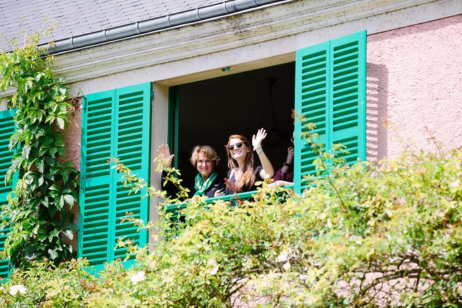 From Paris: Monet Gardens & Giverny Bike Tour with Picnic Stop - Entering Giverny through its church and cemetery