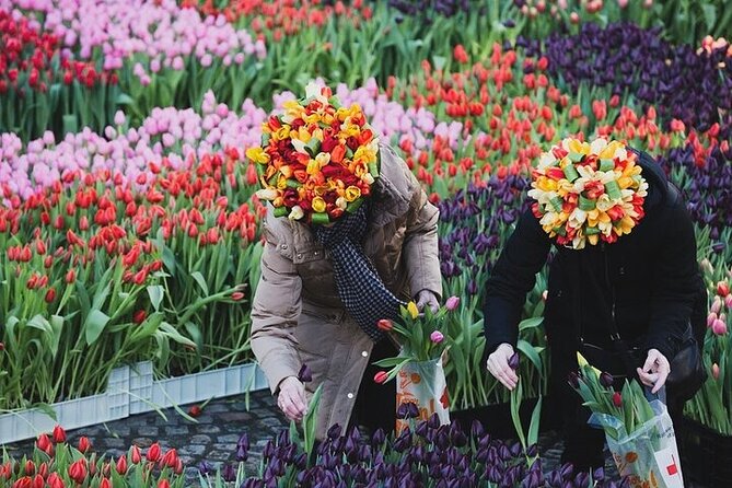 Full-Day Trip From Amsterdam to Keukenhof, Zaanse Schans + Cruise - The Amsterdam canal cruise as the day’s final view