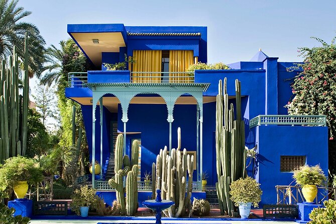 Majorelle Garden, St Laurent,Berber Museum Round-trip & Tickets - Entering Majorelle Garden and its famous blue walls