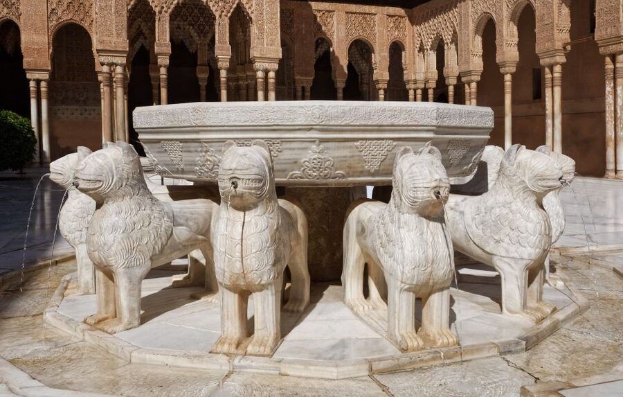 Malaga: Granada Day Trip with Alhambra, Palaces and Gardens - Entering the Alhambra and Nasrid Palaces