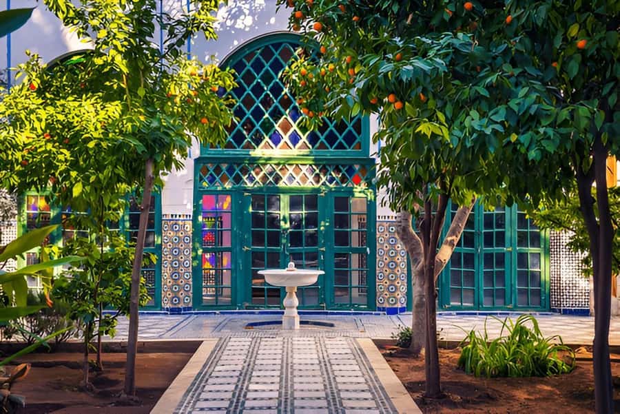 Marrakech: Ben Youssef, Secret Garden, & Souks Walking Tour - The souks show Marrakech at work