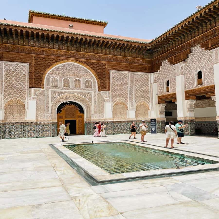 Marrakech: Madrasa Ben Youssef, Secret Garden & Medina Tour - Through the souks, craft workshops and old hammam culture