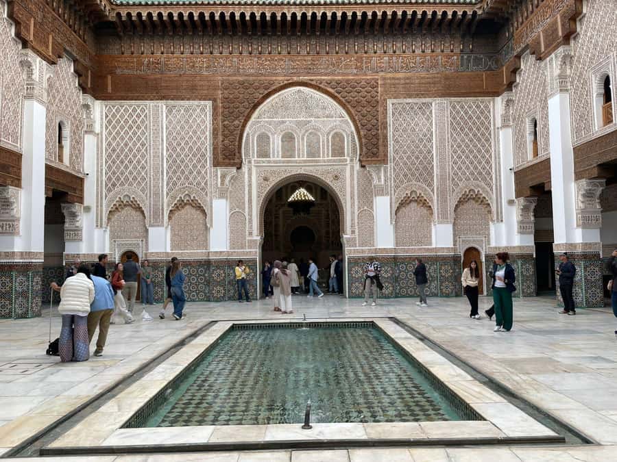 Marrakech: Madrasa Ben Youssef, Secret Garden & Medina Tour - Meeting at Jemaa el-Fna and finding your guide