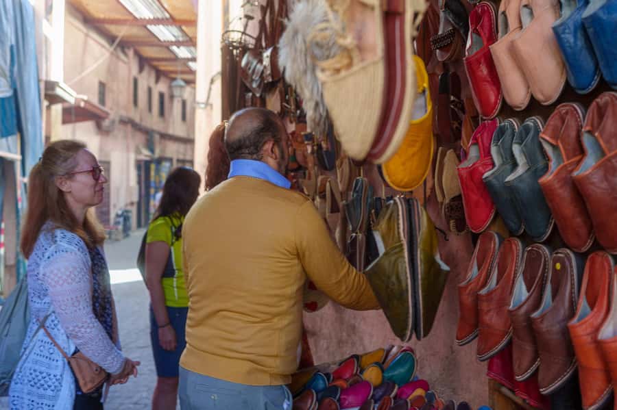 Marrakech: Medina, Souks, Artisans Guided Tour with Mint Tea - Ben Youssef Madrasa and changing stop details