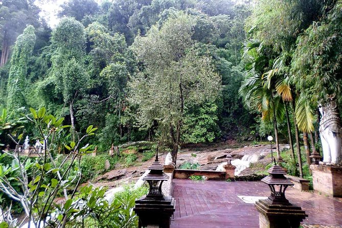One Day Tour Doi Suthep Temple, Palad Temple, Orchid Farm, Longneck hill tribe village (Private tour) - The guide and driver shape the whole day