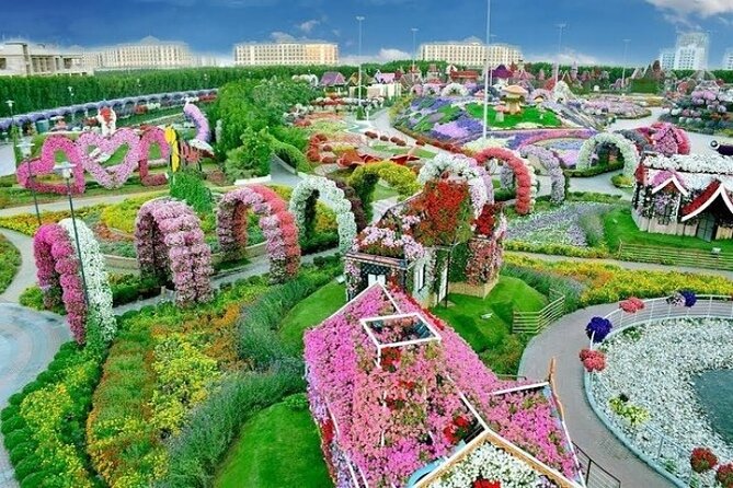 Private Dubai City Tour with Miracle Garden Ticket - Meena Bazaar brings in Old Dubai