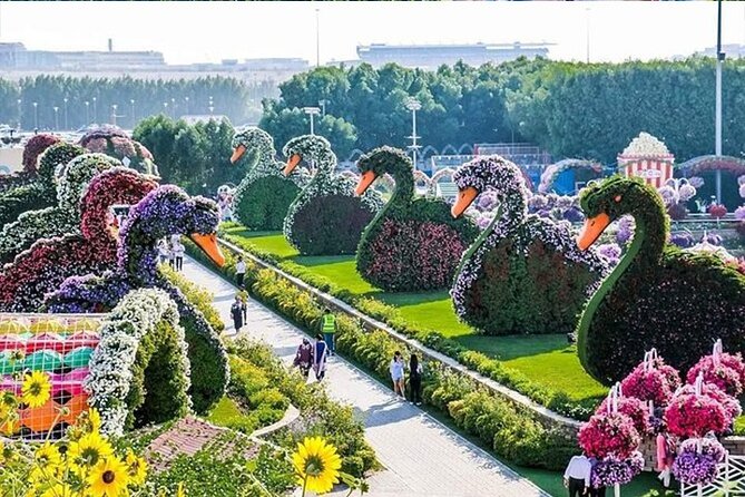 Private Dubai City Tour with Miracle Garden Ticket - Souk Madinat pairs shopping with Burj Al Arab views