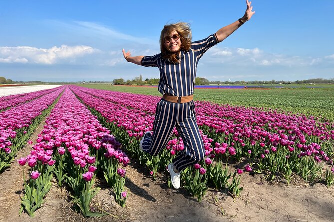 Private Guided Keukenhof Gardens and Zaanse Schans Tour - Climbing inside De Kat paint mill
