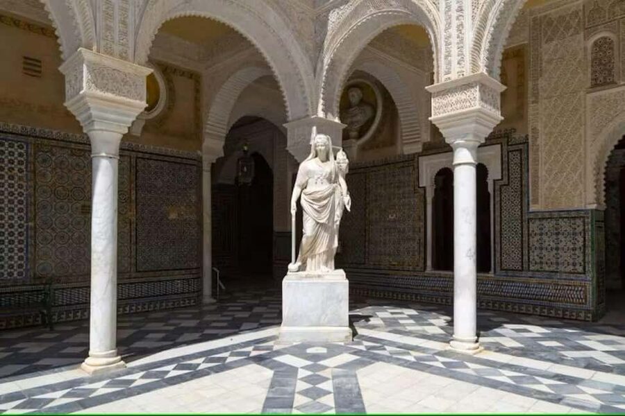 Seville: Guided Tour of Noble Houses and Grand Gardens - Palacio de Dueñas, layers of Gothic-Mudejar and Renaissance style