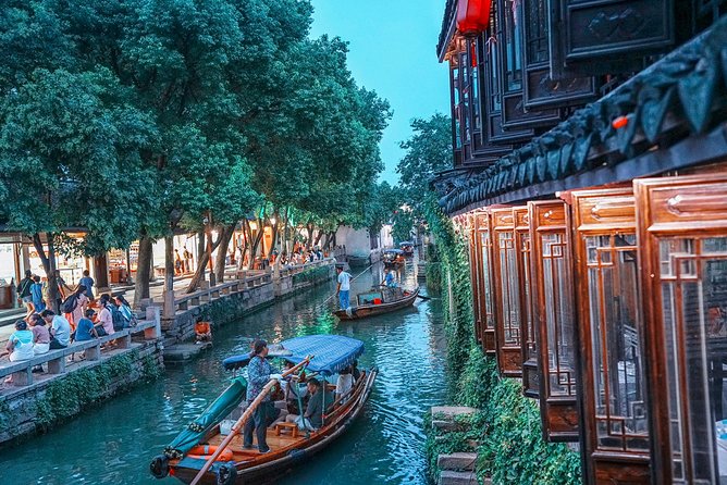 Shanghai Bus Tour:Yu Garden,Chenghuang,Zhujiajiao Water Town,Bund - What is included, and where extra costs appear
