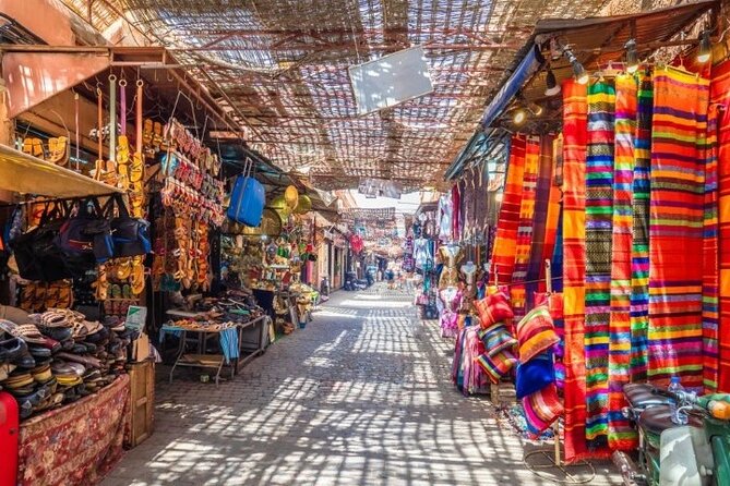 tour of marrakech-medina, souks, secret gardens,Madrassa& stories - Koutoubia Mosque and the red-city skyline