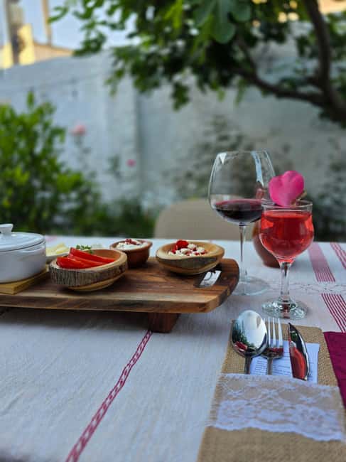 Traditional Food Tour,Dinner in a Local Garden(Eat as local) - A garden table beneath vines and roses