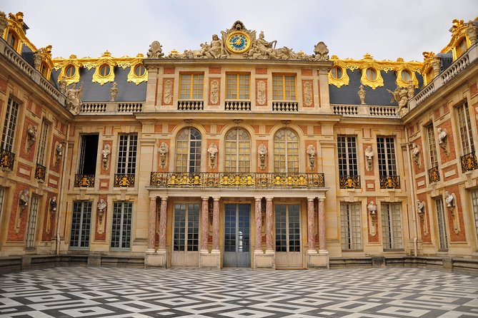 Versailles Private Day Excursion with Palace, Gardens & Trianon - Walking the formal gardens with a guide