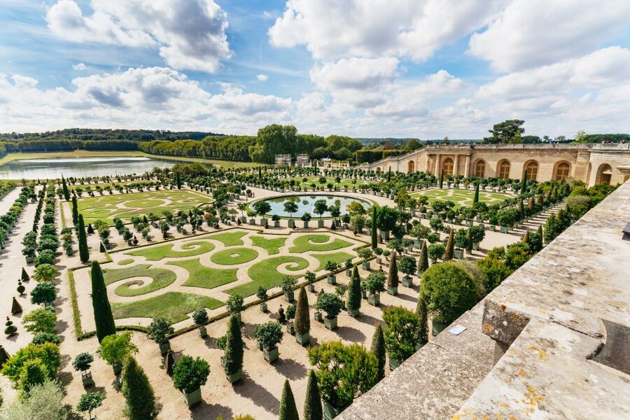 Clipped box parterres and gravel walks below the palace terrace at Versailles