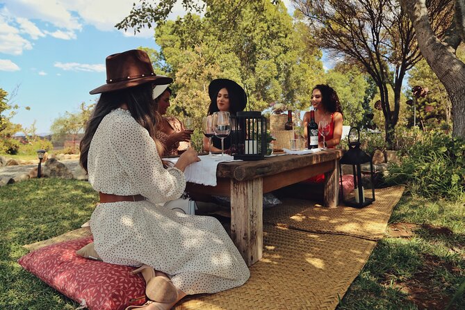 Wine tasting in private gardens overlooking the vineyards - The $55 price and what you receive